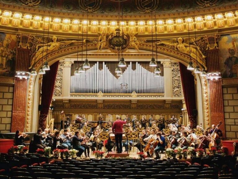 Orchestra rehearsing in theater